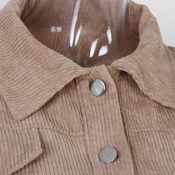 Short women's corduroy jacket with puff sleeves and pockets