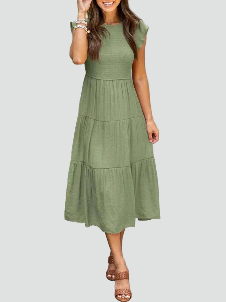 Comfortable midi dress with ruffles on the sleeves and a loose fit