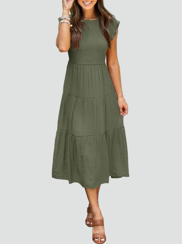 Comfortable midi dress with ruffles on the sleeves and a loose fit
