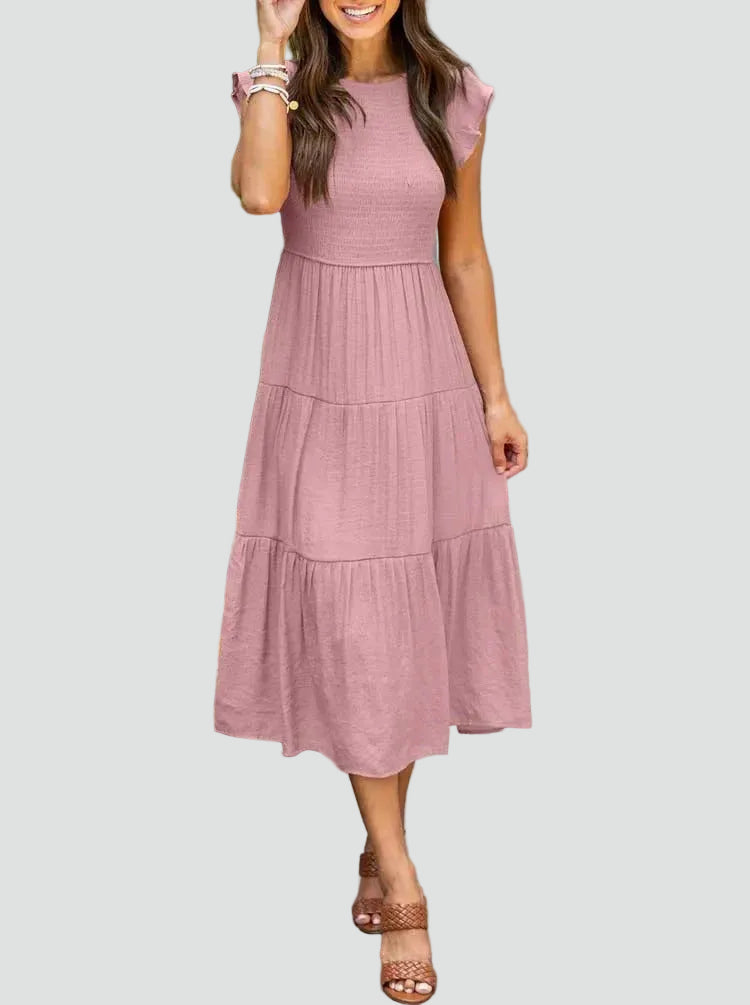 Comfortable midi dress with ruffles on the sleeves and a loose fit