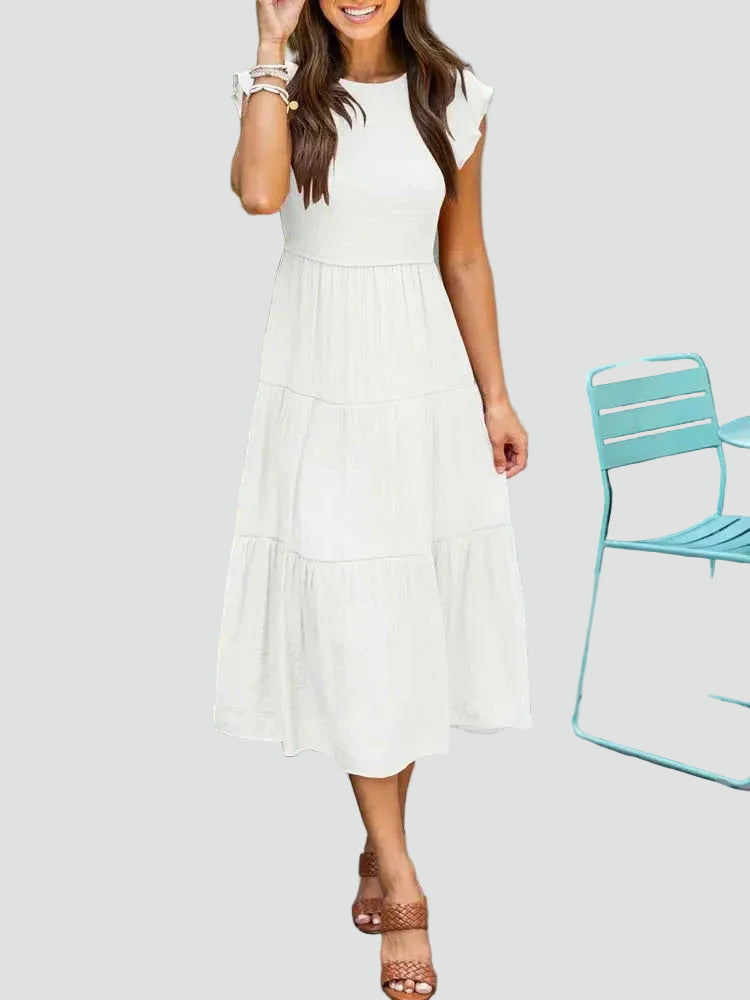 Comfortable midi dress with ruffles on the sleeves and a loose fit