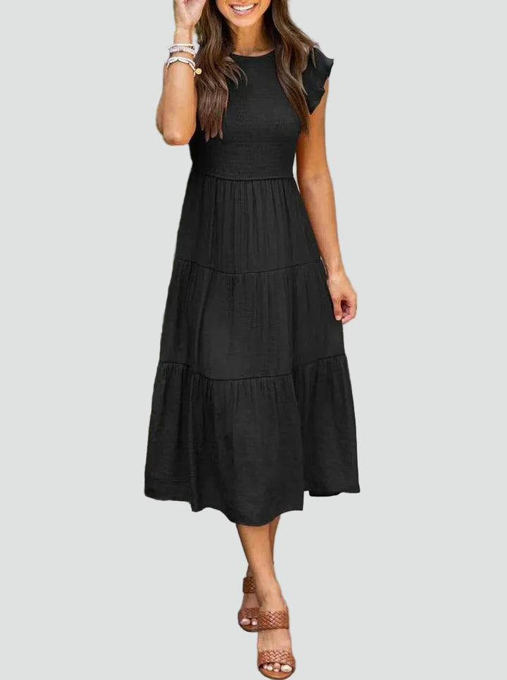 Comfortable midi dress with ruffles on the sleeves and a loose fit