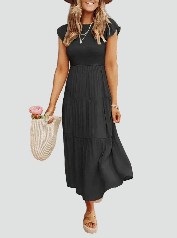 Comfortable midi dress with ruffles on the sleeves and a loose fit