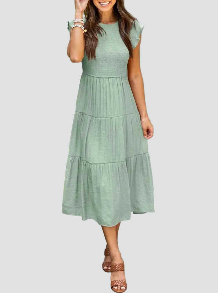Comfortable midi dress with ruffles on the sleeves and a loose fit