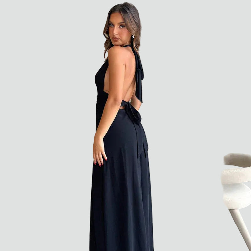 Maxi evening dress halter with deep neckline and slit