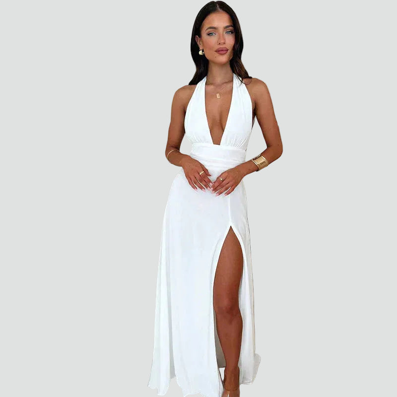 Maxi evening dress halter with deep neckline and slit