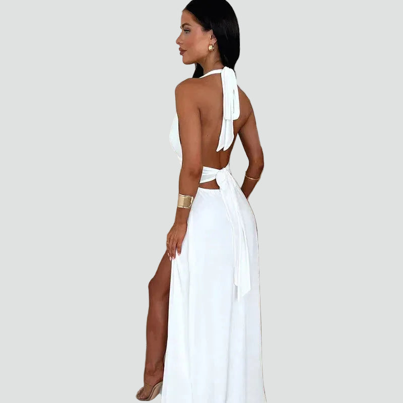 Maxi evening dress halter with deep neckline and slit