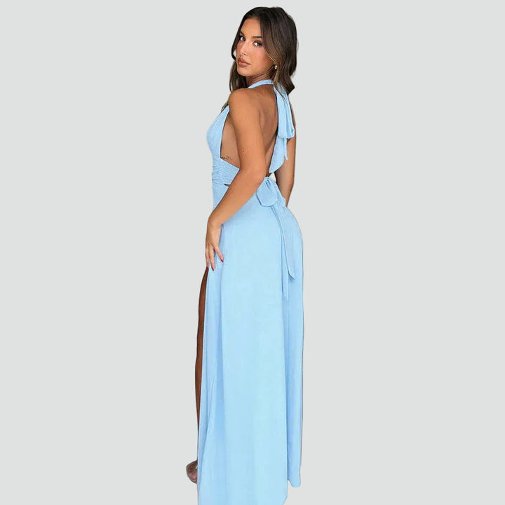 Maxi evening dress halter with deep neckline and slit