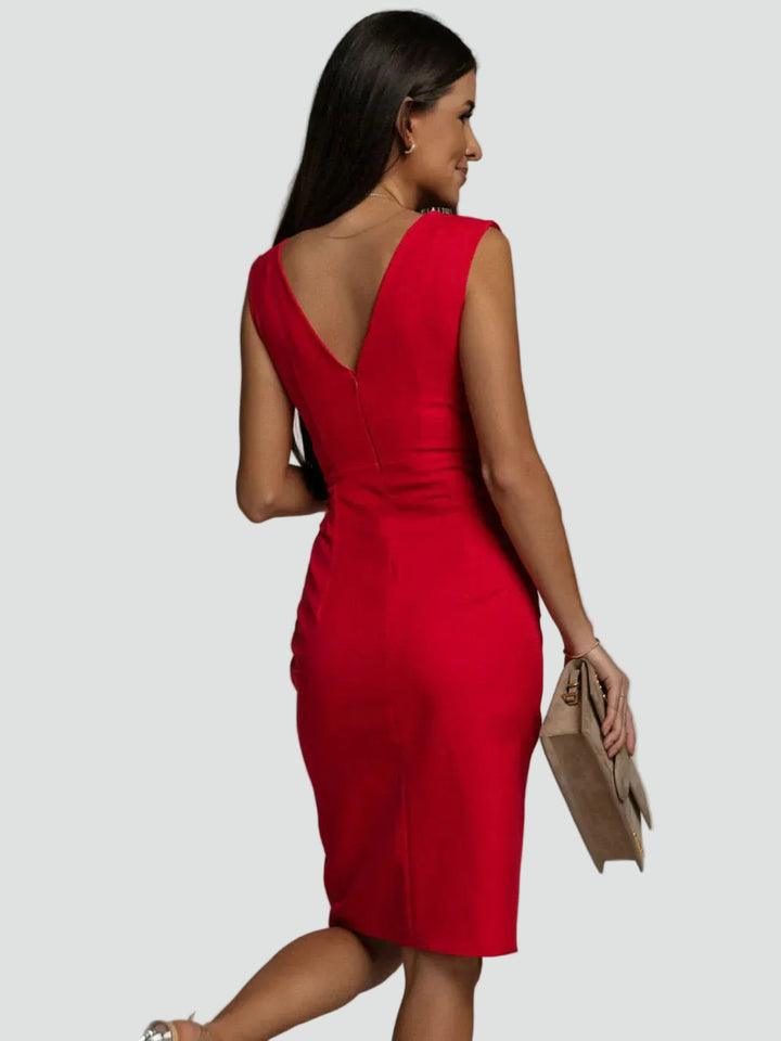Draped women's occasion dress with slit and wrap neckline