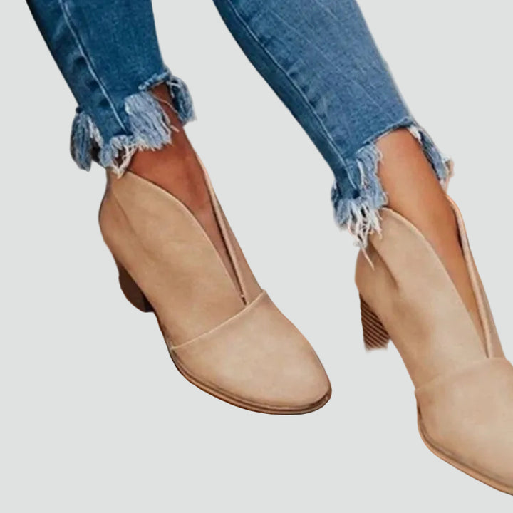 Block heel pumps with a deep cutout and elegant design