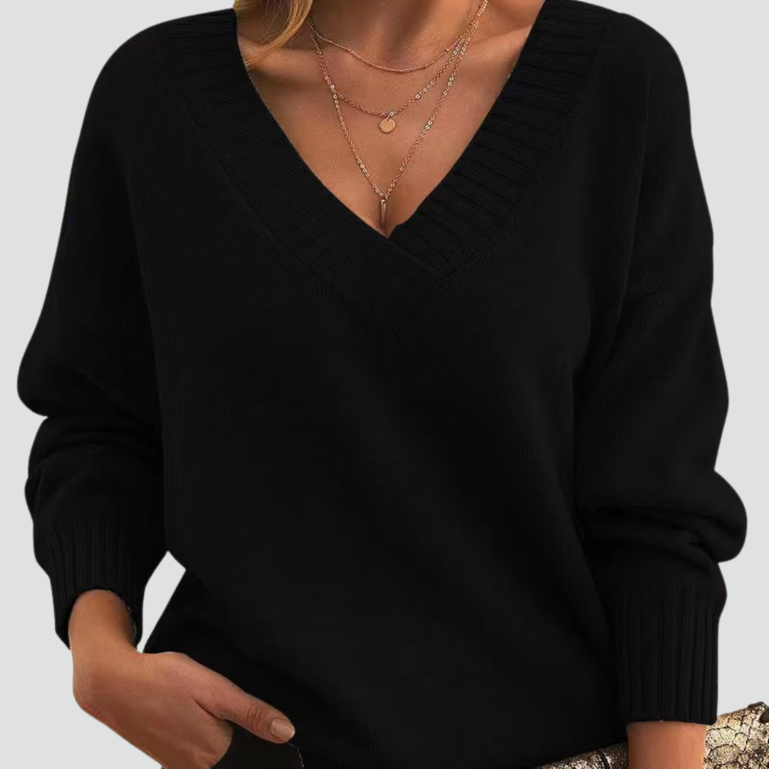 Classic sweater for women with V-neck and ribbed cuffs