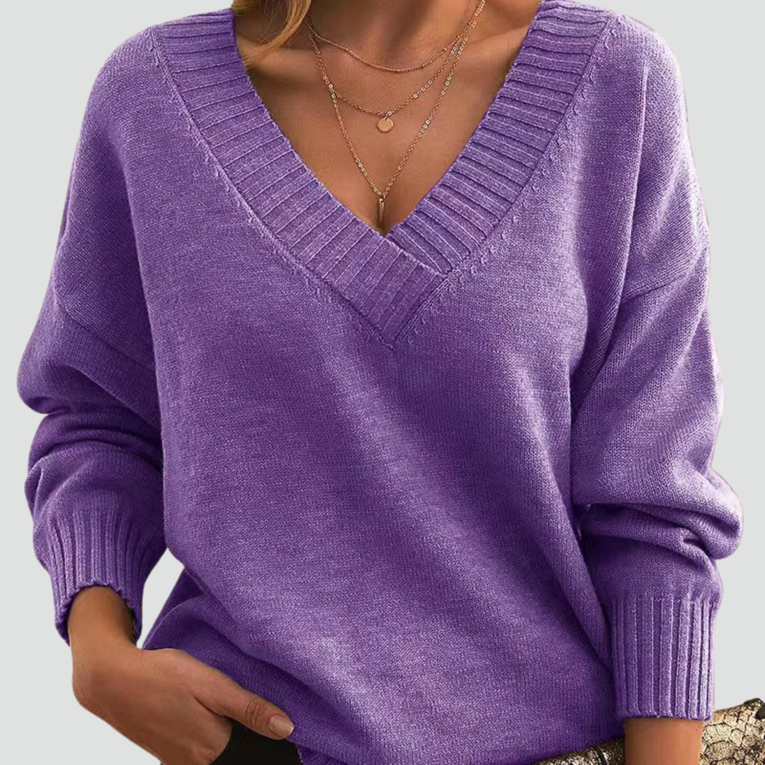 Classic sweater for women with V-neck and ribbed cuffs