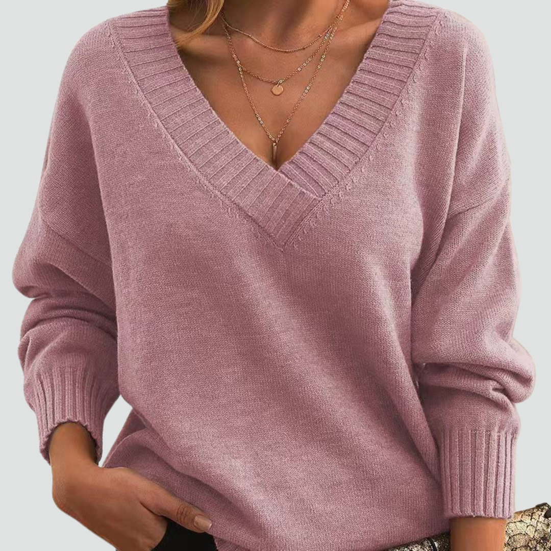 Classic sweater for women with V-neck and ribbed cuffs