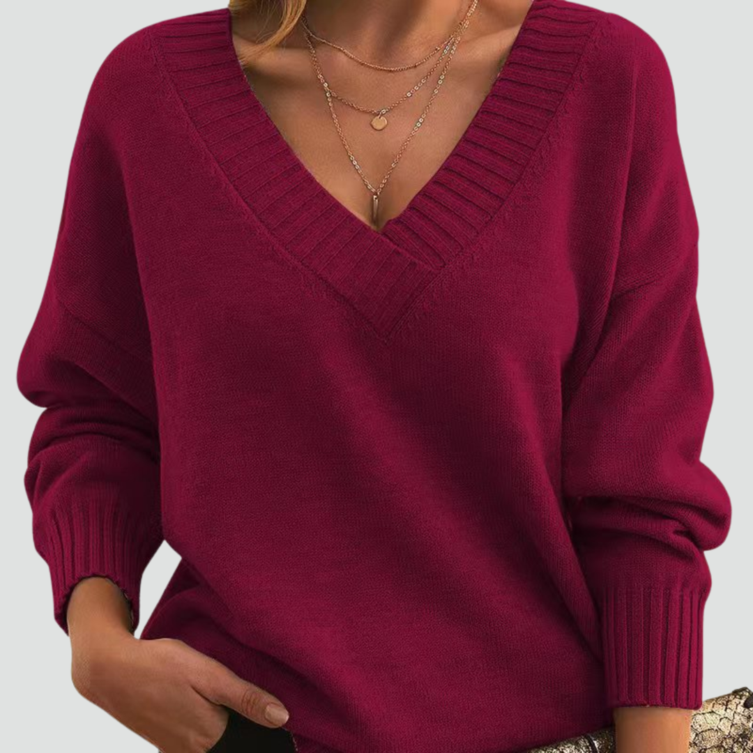 Classic sweater for women with V-neck and ribbed cuffs