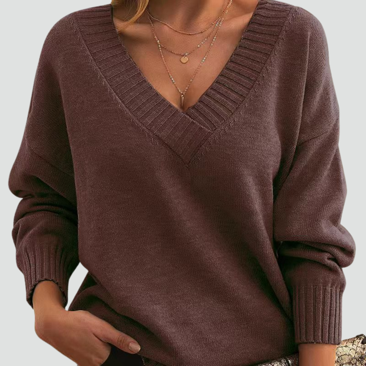 Classic sweater for women with V-neck and ribbed cuffs