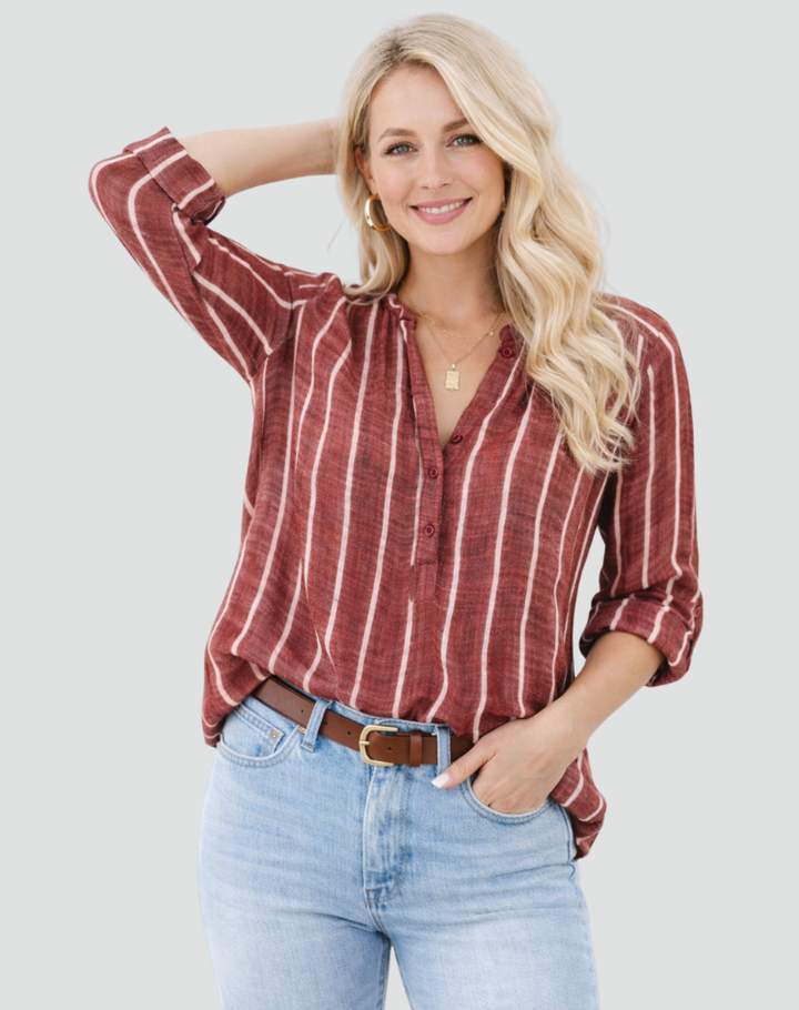 Loose striped women's button-up shirt with long sleeves