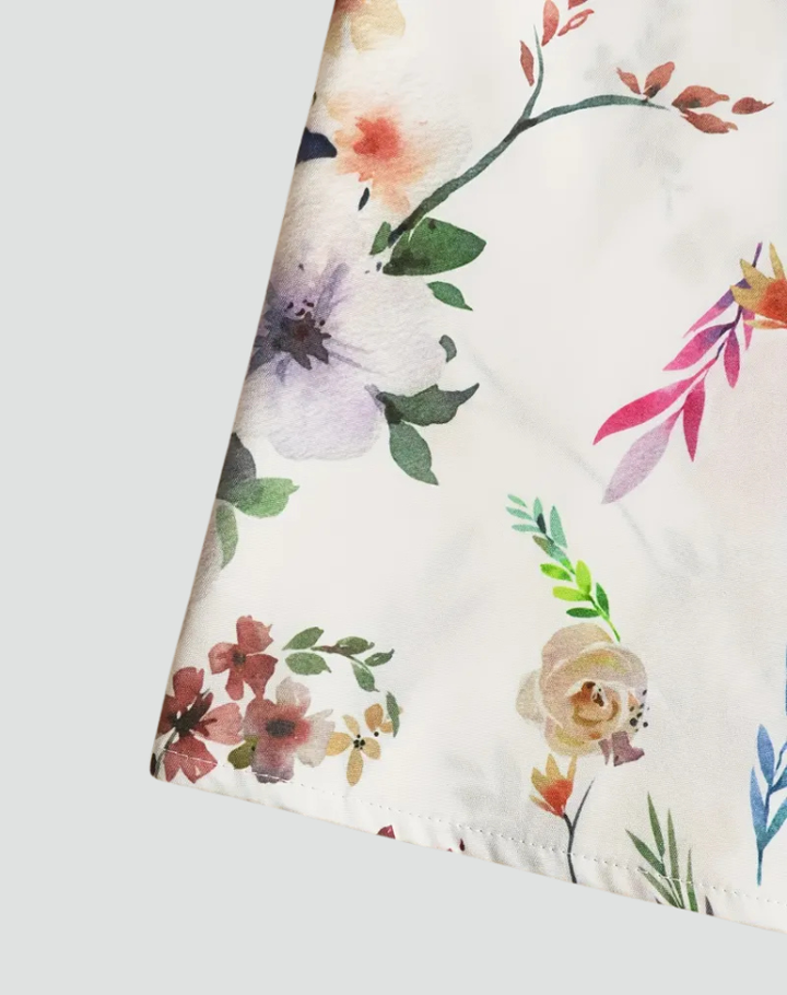 Floral sleeveless top with a wrap neckline