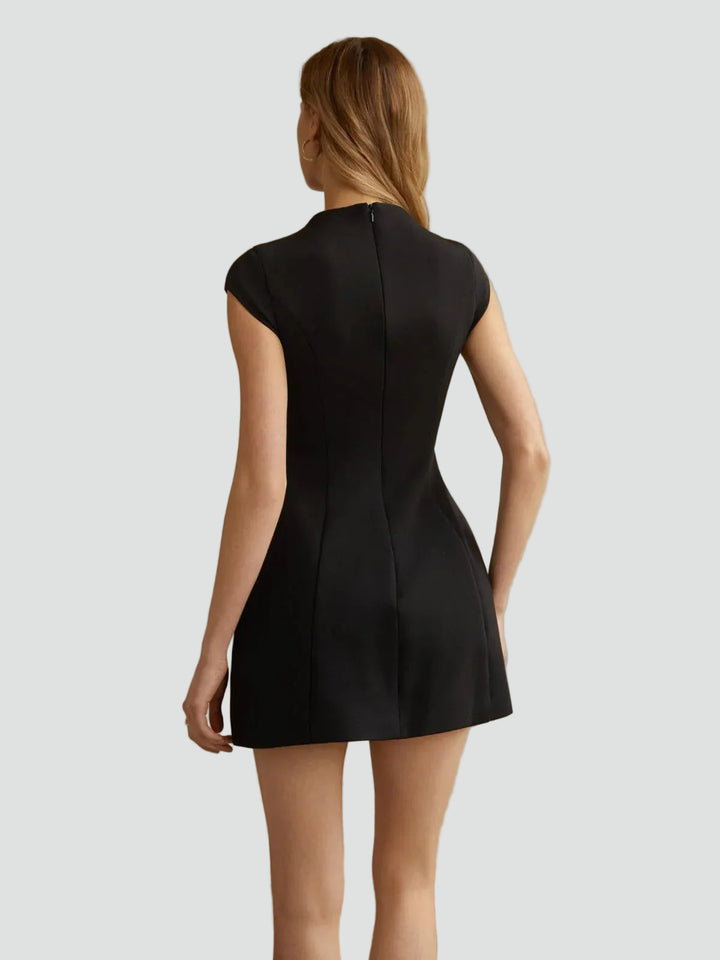 Fitted elegant women's mini dress with decorative pockets