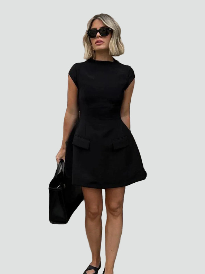 Fitted elegant women's mini dress with decorative pockets