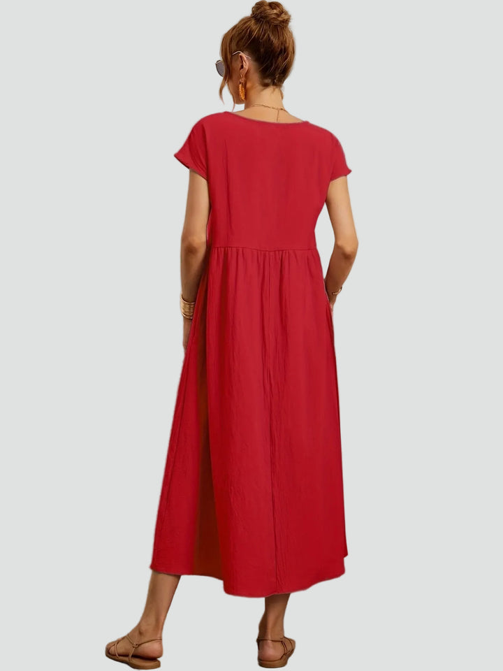 Zwiewna sukienka midi z krótkim rękawem i kieszeniami