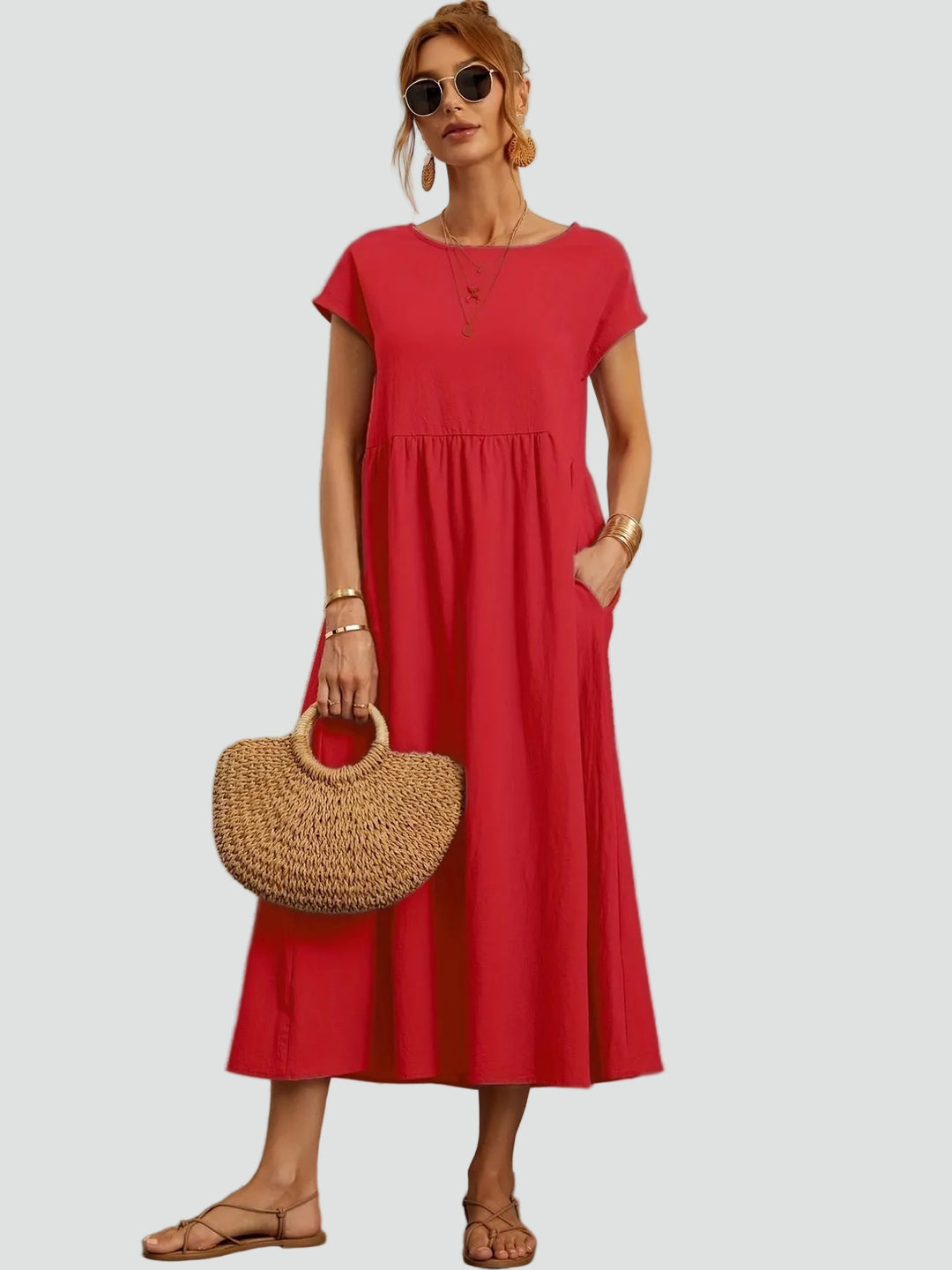 Zwiewna sukienka midi z krótkim rękawem i kieszeniami