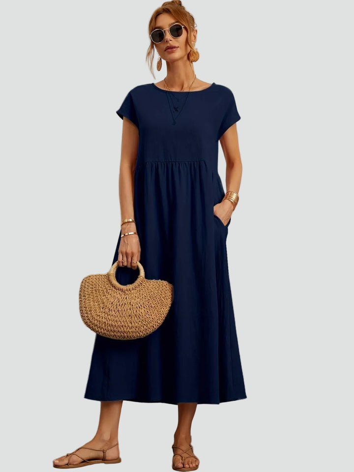 Zwiewna sukienka midi z krótkim rękawem i kieszeniami