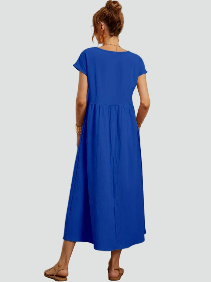 Zwiewna sukienka midi z krótkim rękawem i kieszeniami