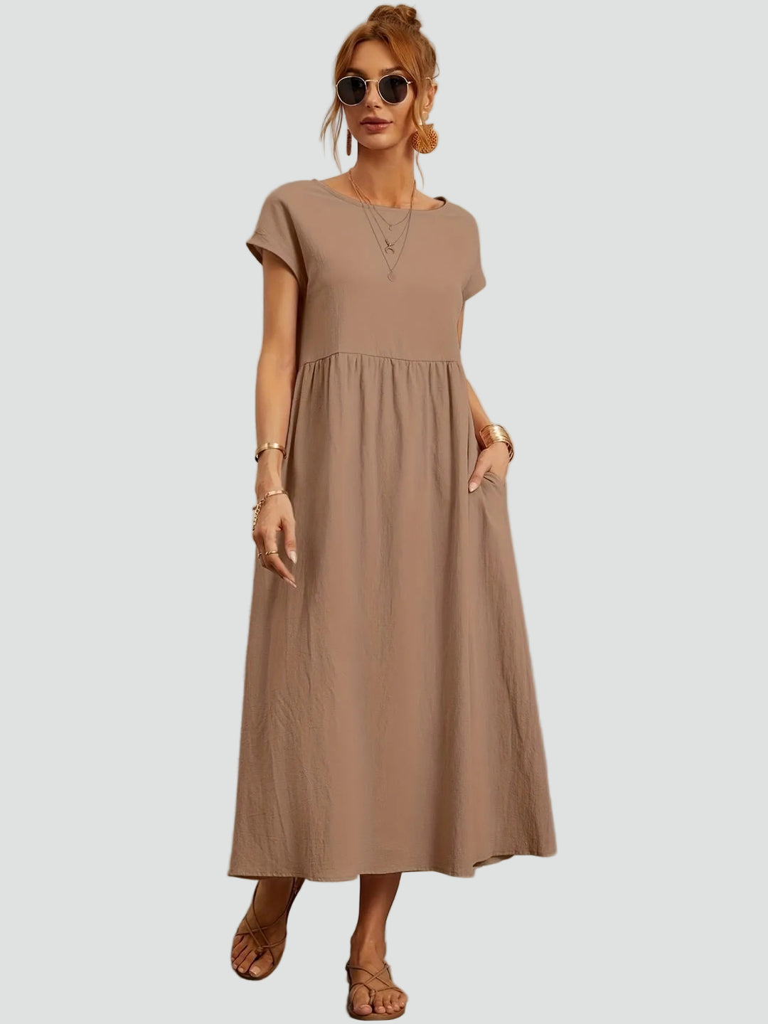 Zwiewna sukienka midi z krótkim rękawem i kieszeniami