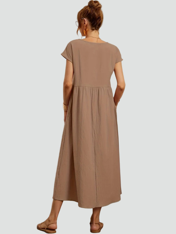 Zwiewna sukienka midi z krótkim rękawem i kieszeniami