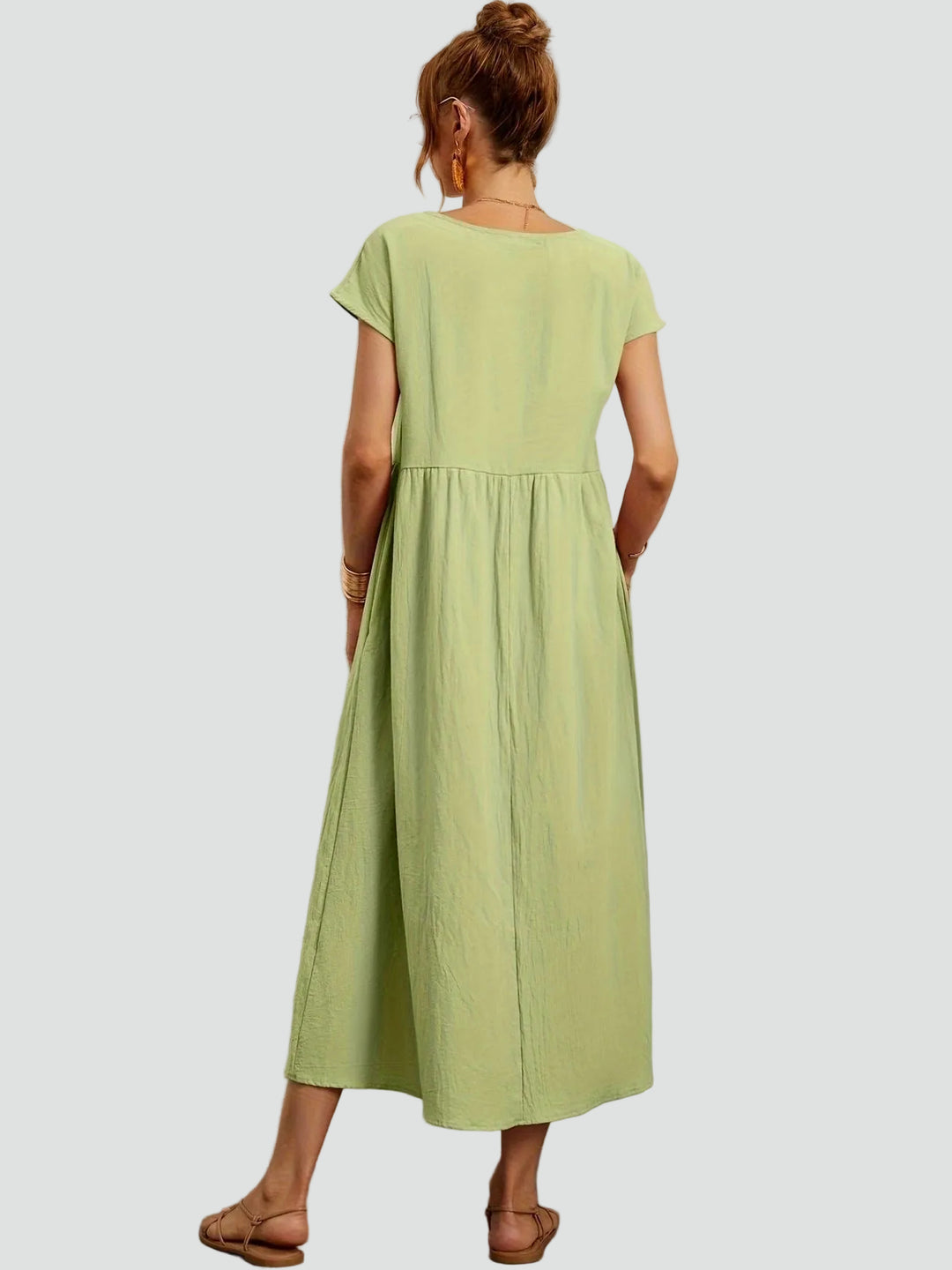 Zwiewna sukienka midi z krótkim rękawem i kieszeniami