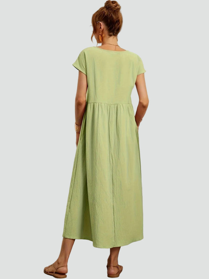 Zwiewna sukienka midi z krótkim rękawem i kieszeniami