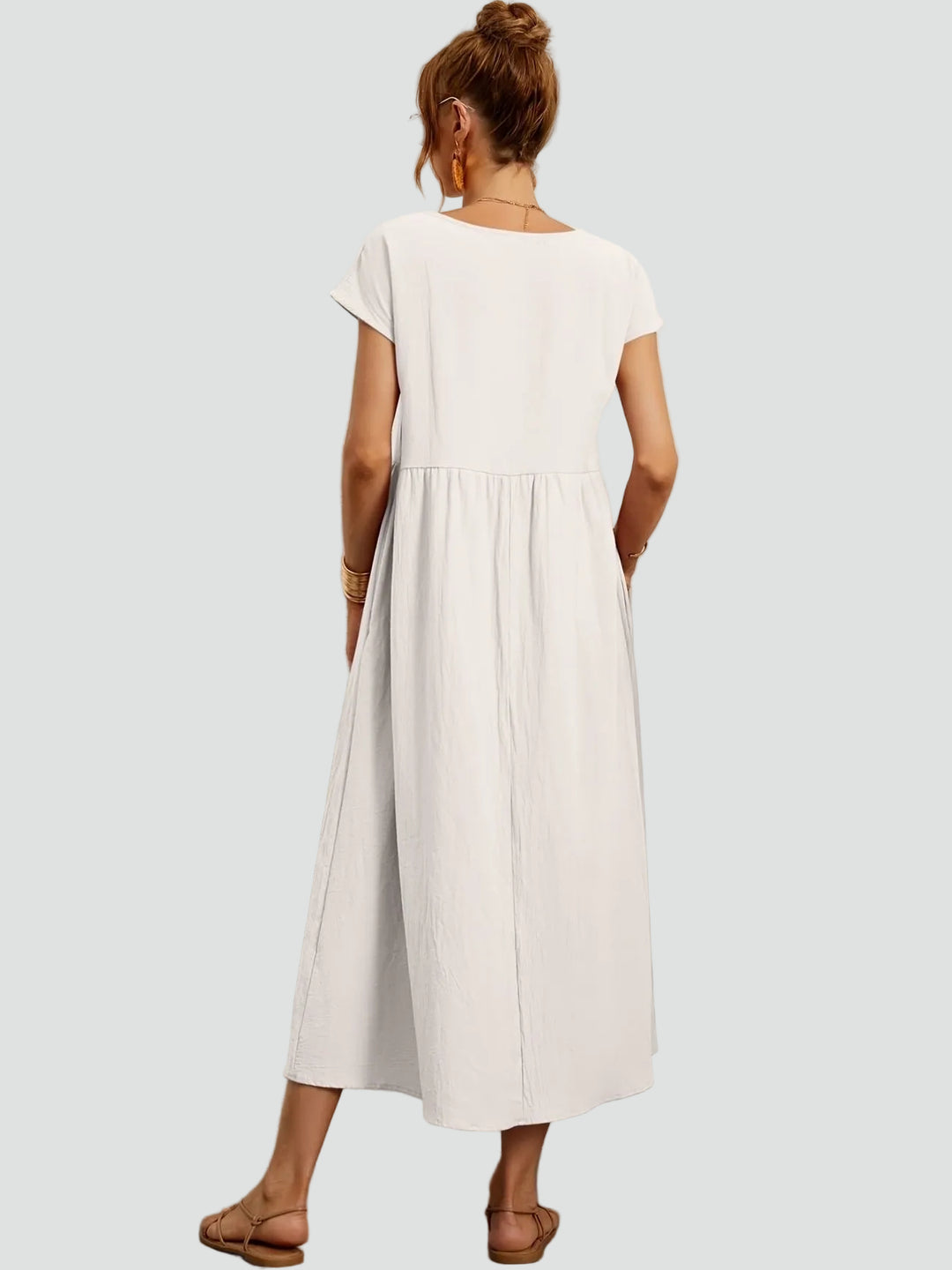 Zwiewna sukienka midi z krótkim rękawem i kieszeniami