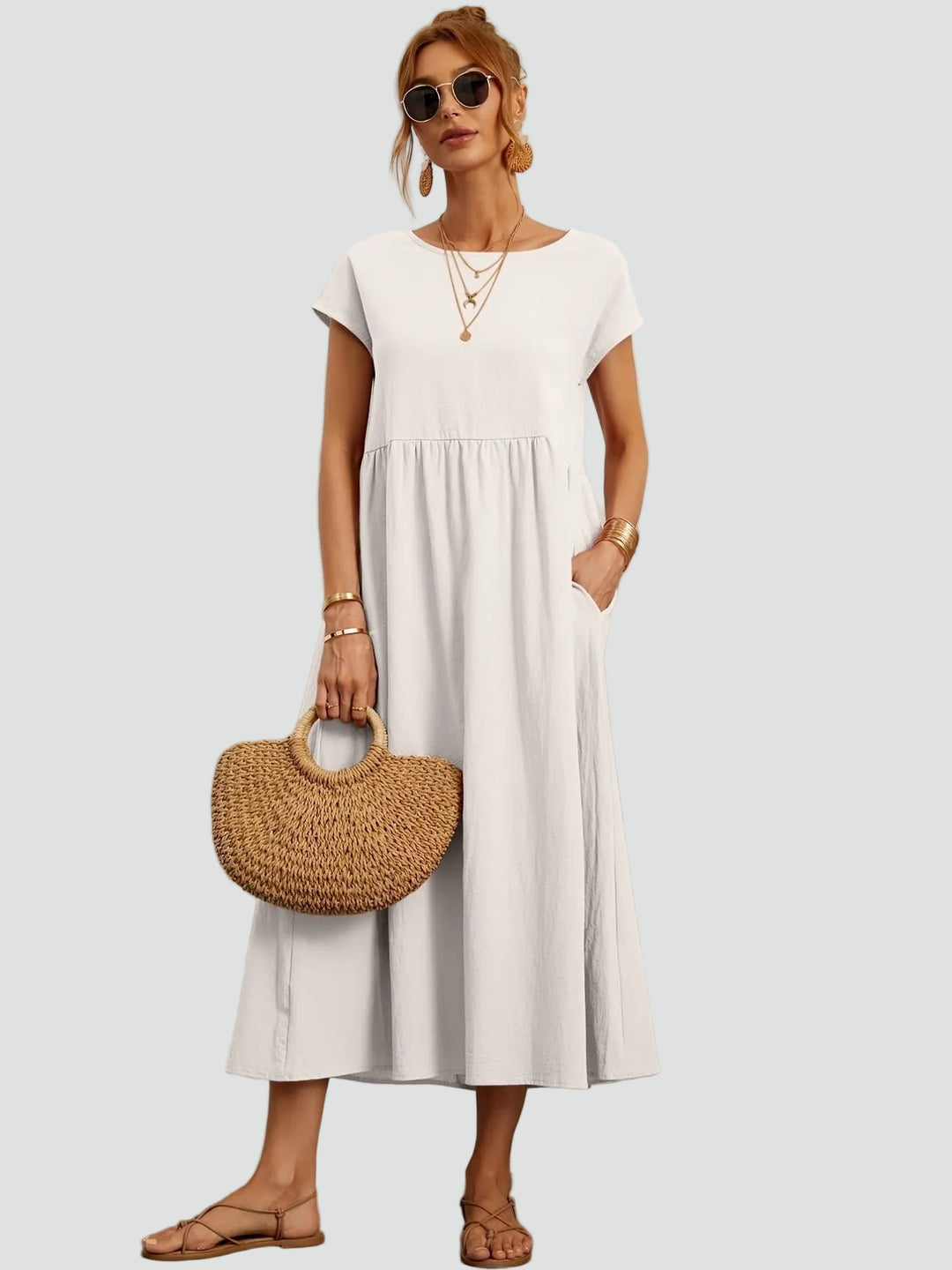 Zwiewna sukienka midi z krótkim rękawem i kieszeniami