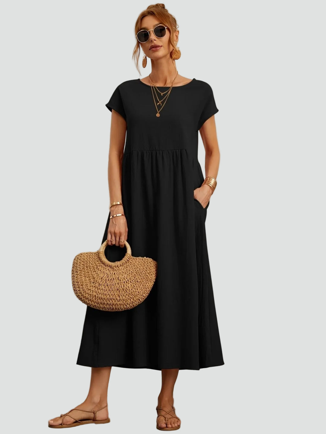 Zwiewna sukienka midi z krótkim rękawem i kieszeniami