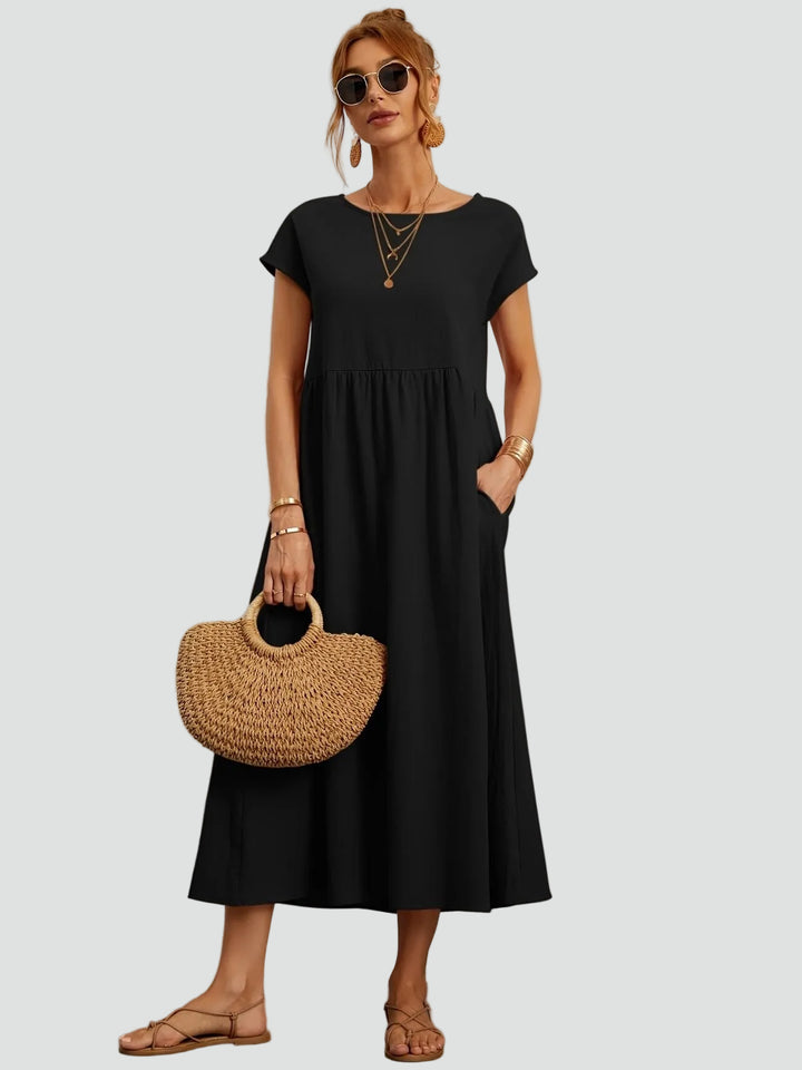 Zwiewna sukienka midi z krótkim rękawem i kieszeniami