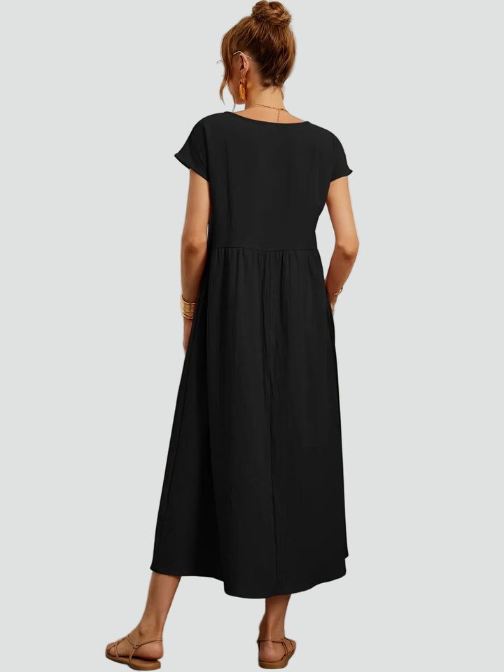 Zwiewna sukienka midi z krótkim rękawem i kieszeniami