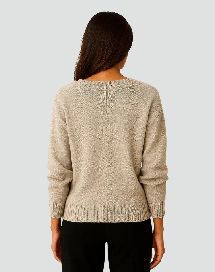 Pull doux pour femmes avec encolure en V et poignets côtelés