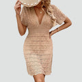 Summer mini boho eyelet dress with V-neck for the beach