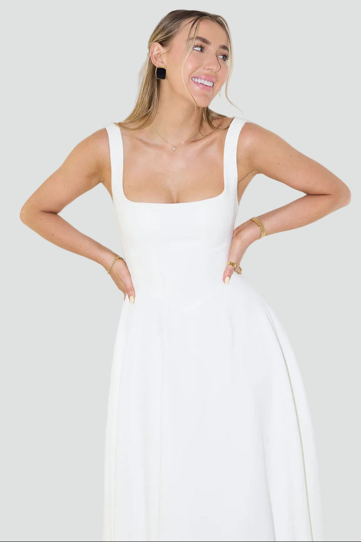 Elegancka damska sukienka midi koktajlowa o rozkloszowanym kroju