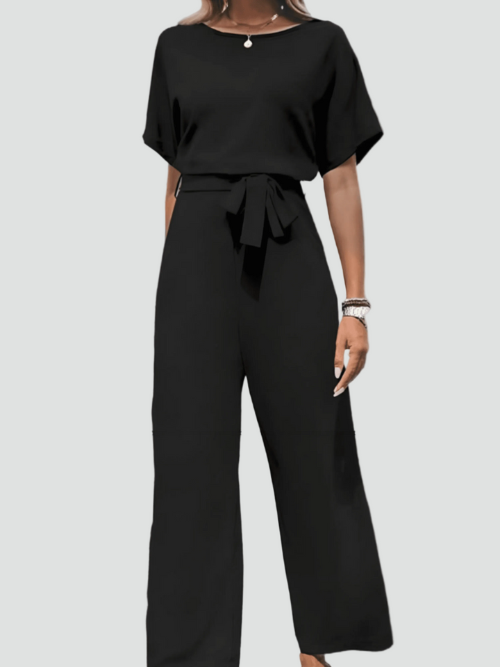 Elegant women's jumpsuit with short sleeves and waist belt