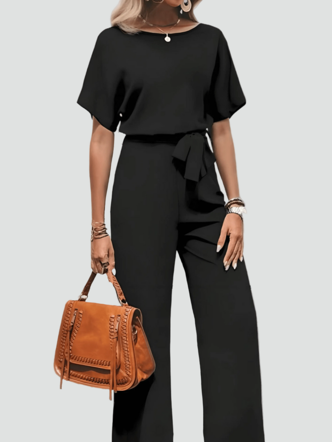 Elegant women's jumpsuit with short sleeves and waist belt