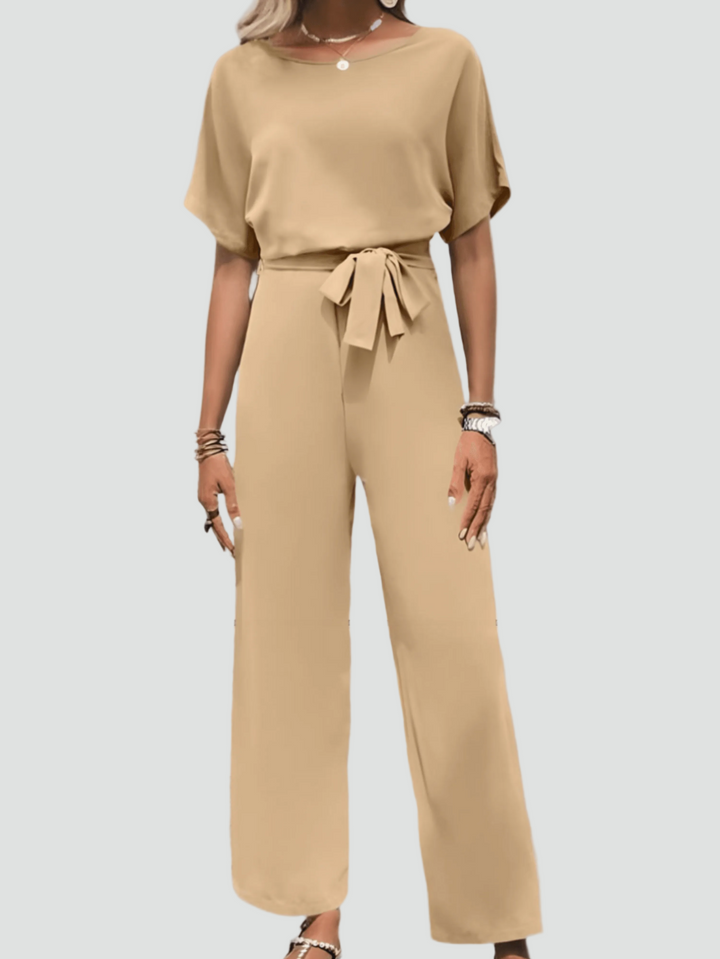 Elegant women's jumpsuit with short sleeves and waist belt