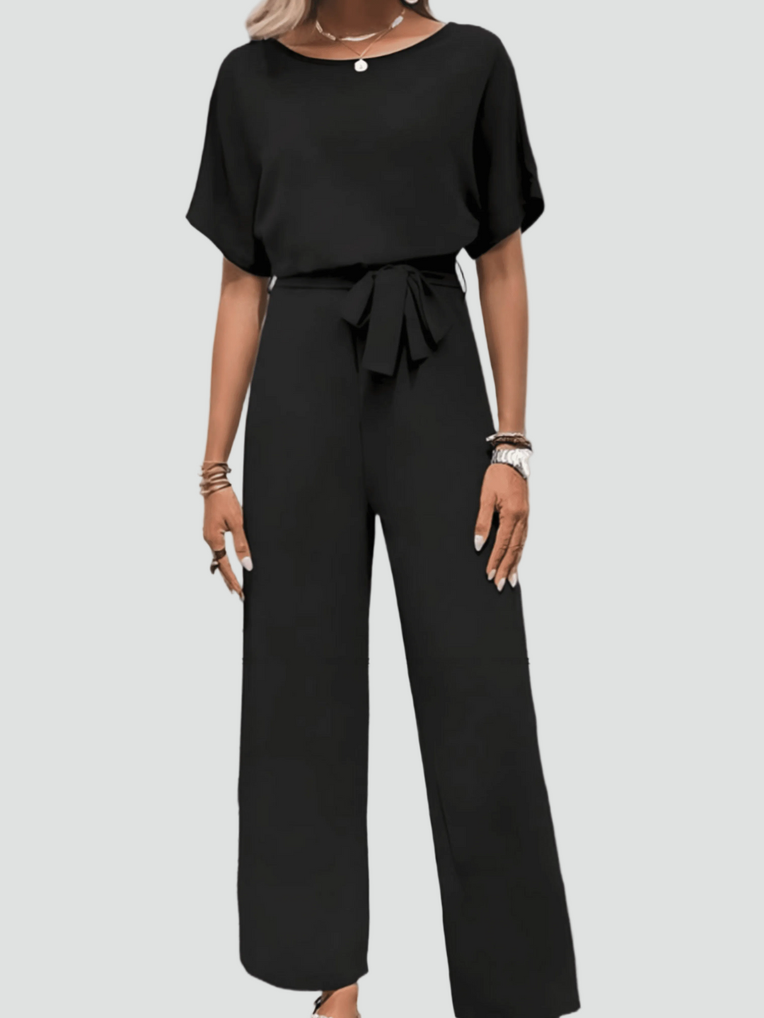 Elegant women's jumpsuit with short sleeves and waist belt