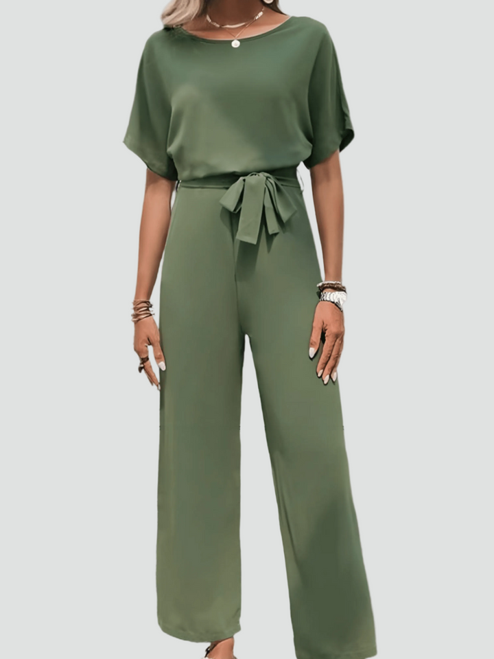 Elegant women's jumpsuit with short sleeves and waist belt
