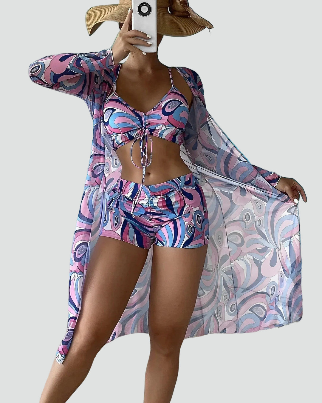 Three-piece swimwear set with beach cover-up and shorts