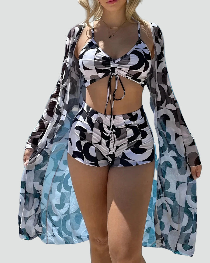 Three-piece swimwear set with beach cover-up and shorts