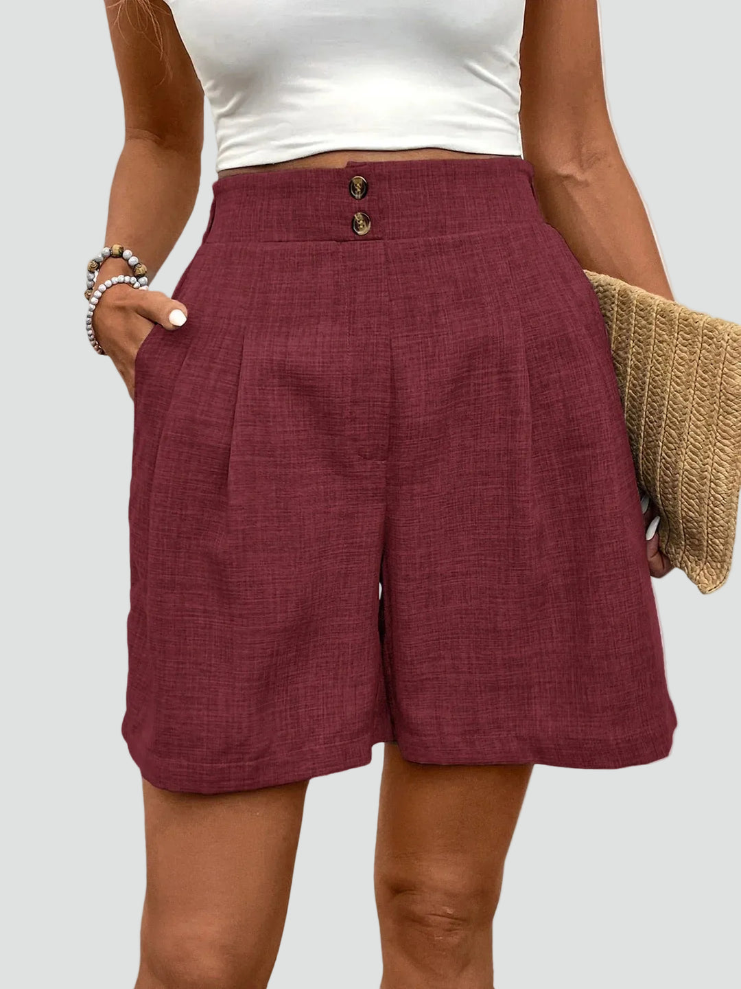 Elegant high-waisted linen shorts with pleats