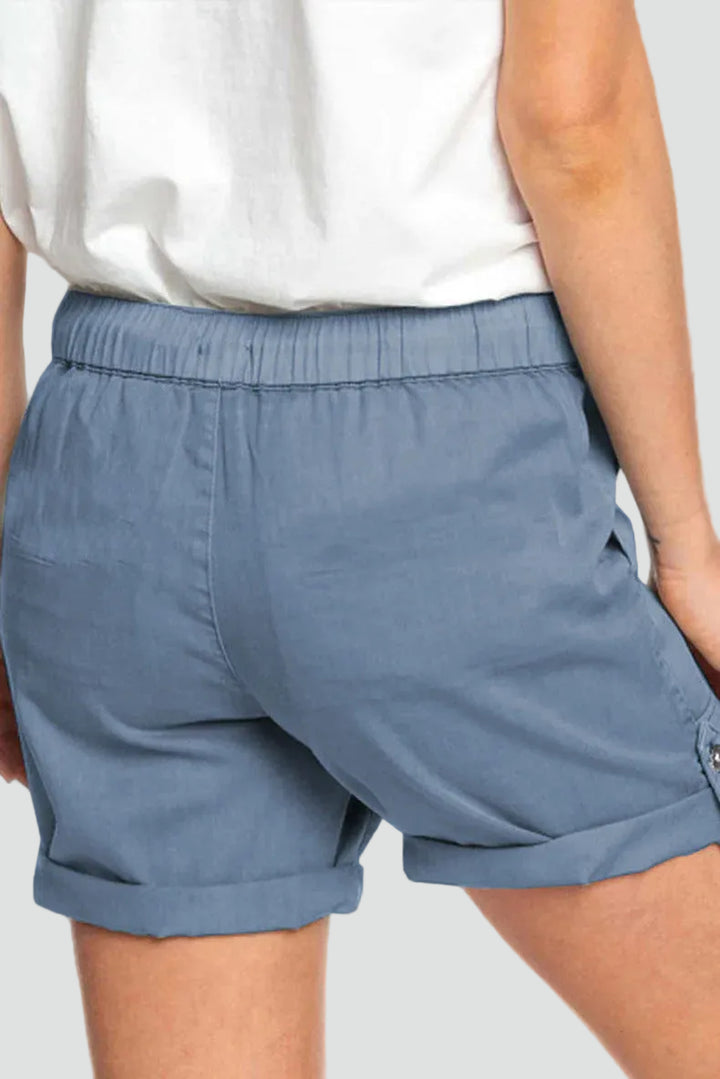 Loose cotton bermuda shorts with elastic waistband and drawstring