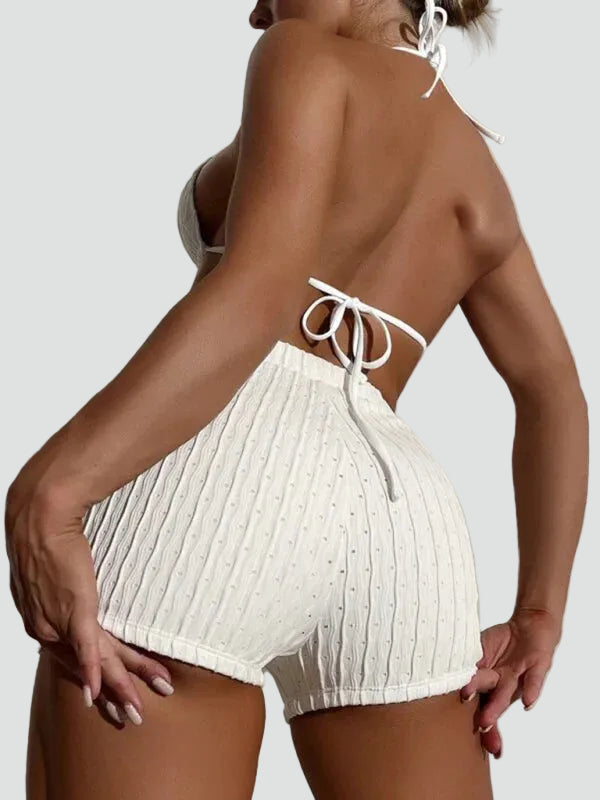 Lace-up high-waisted bikini with a triangular top and shorts