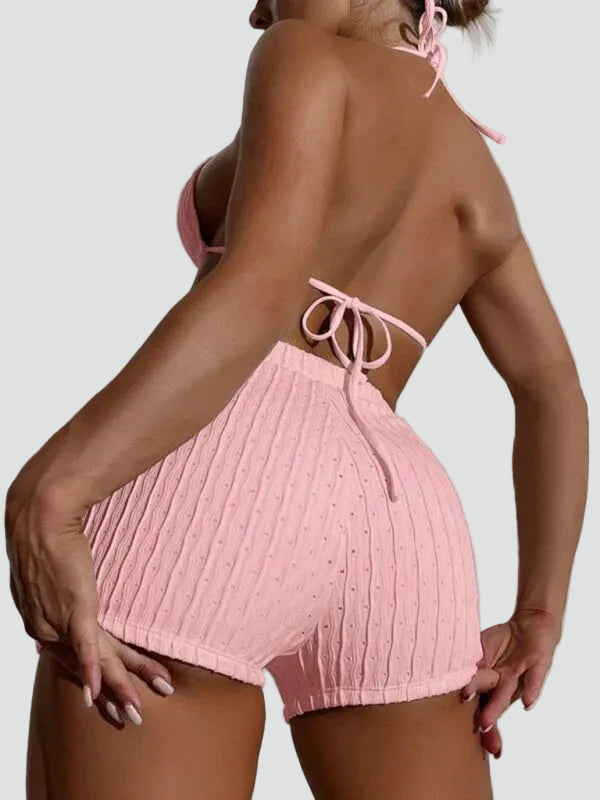 Lace-up high-waisted bikini with a triangular top and shorts